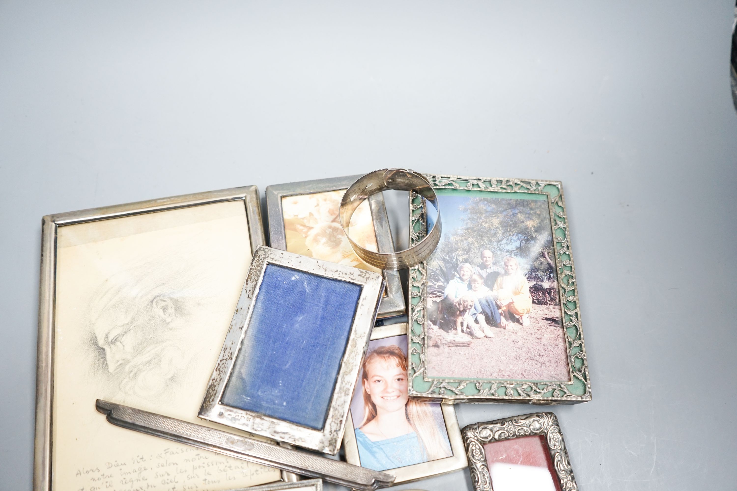 Various silver mounted photograph frames and a silver bangle